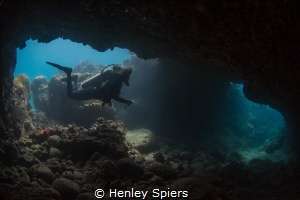 Jade enters the famous Lover's Tunnel in Saint Lucia by Henley Spiers 
